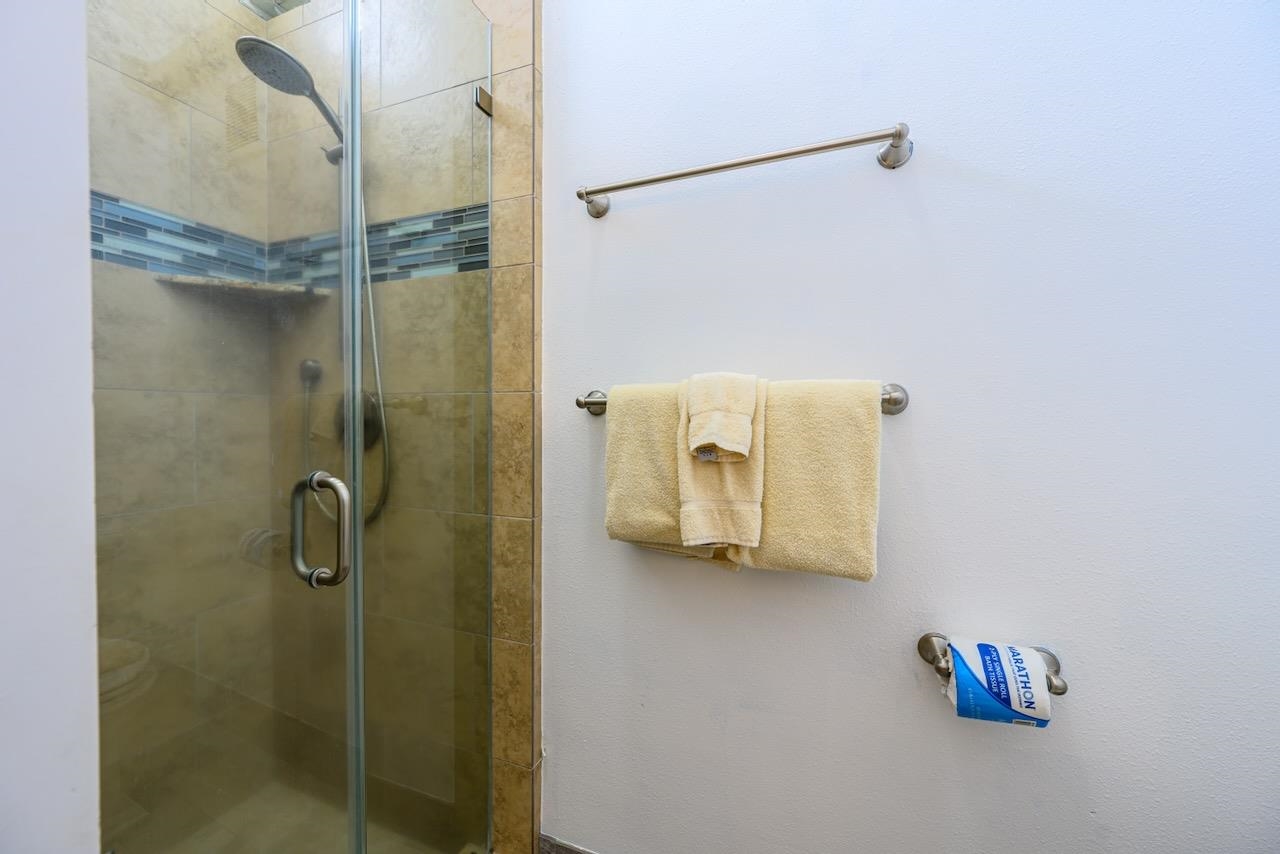 4909 Lower Honoapiilani Road, Unit D6 Lahaina, HI 96761 - Photo 16 of 47 a bathroom with a shower and a shower