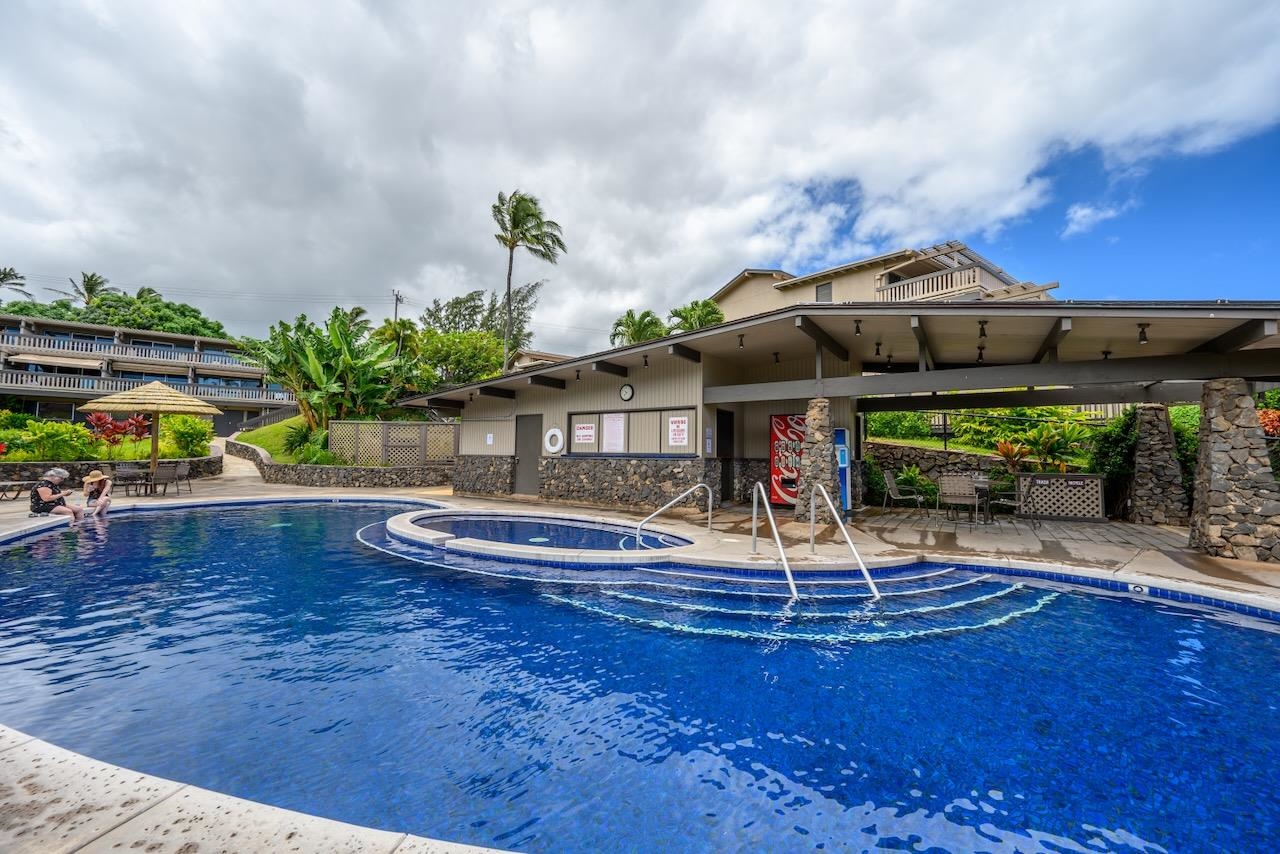 4909 Lower Honoapiilani Road, Unit D6 Lahaina, HI 96761 - Photo 45 of 47 a swimming pool with barbeque oven in front of it