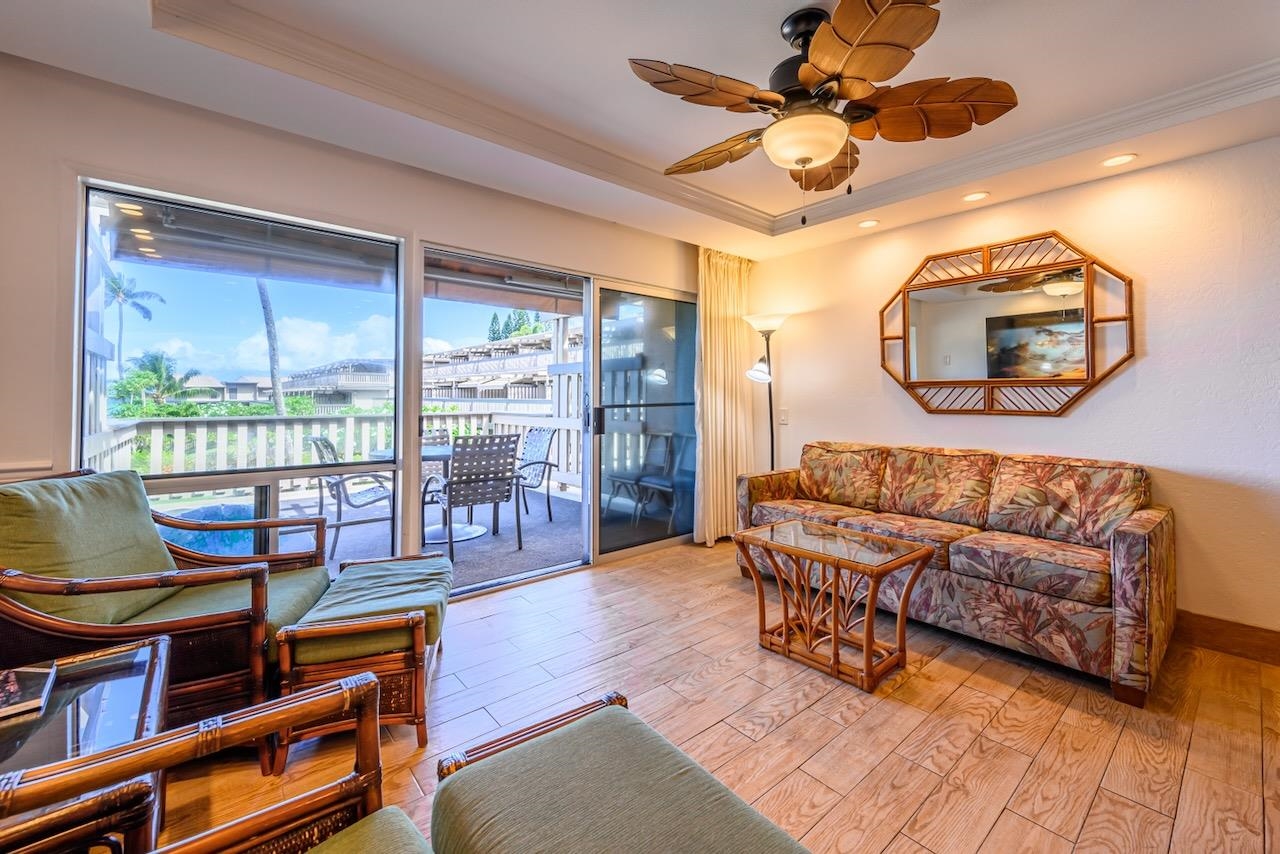 4909 Lower Honoapiilani Road, Unit D6 Lahaina, HI 96761 - Photo 7 of 47 a living room with furniture and a window