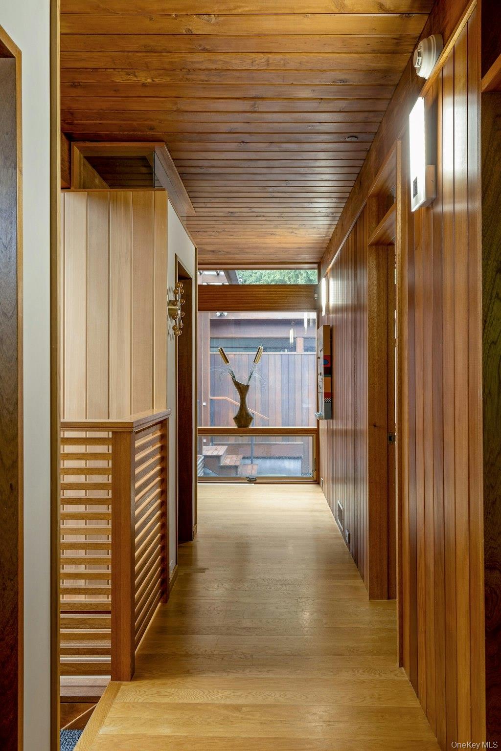14 Cradle Rock Road East Pound Ridge, NY 10576 - Photo 12 of 34 Gracious hallway to the bedroom wing