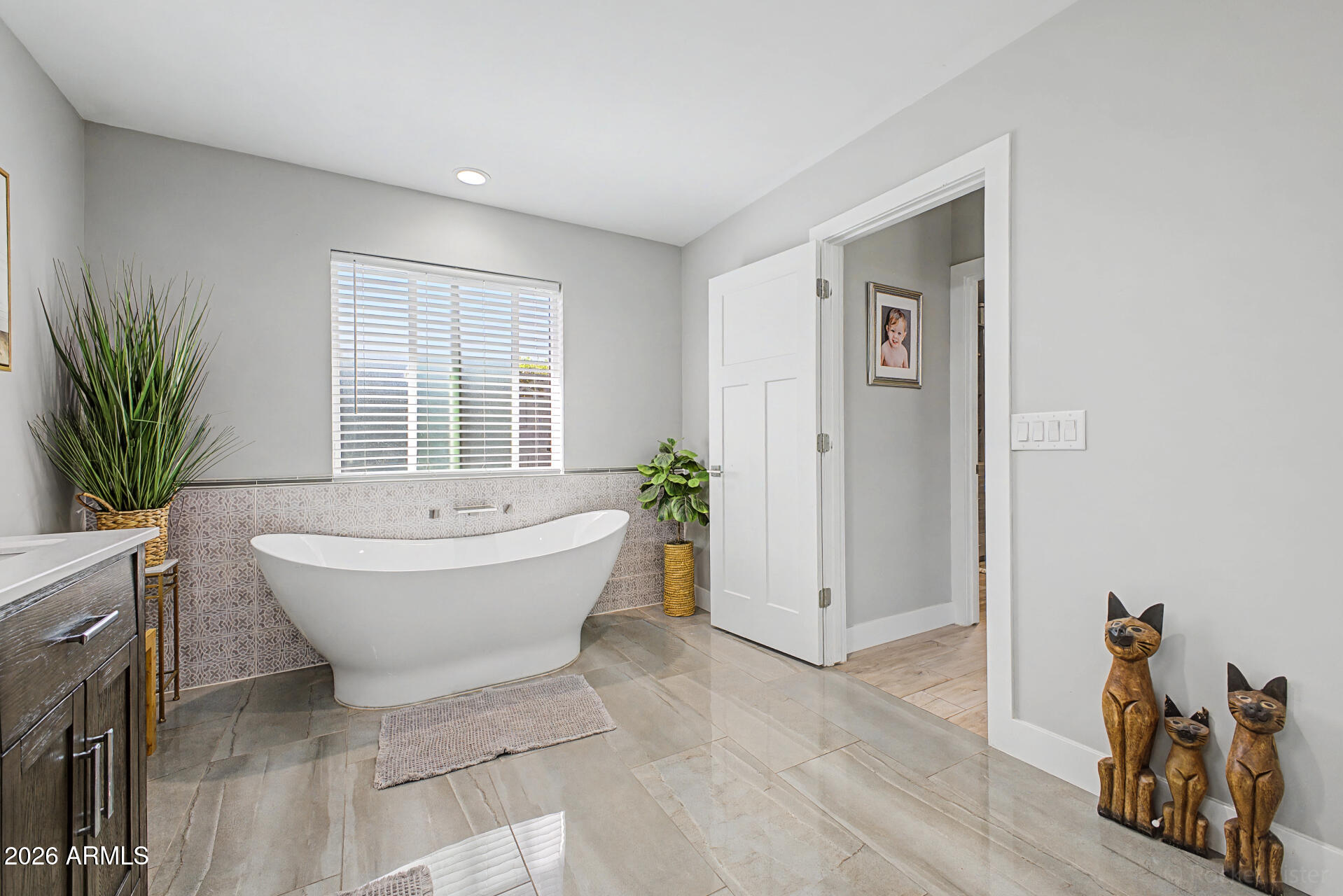 1930 East Rovey Avenue Phoenix, AZ 85016 - Photo 15 of 29 a spacious bathroom with a bathtub and sink