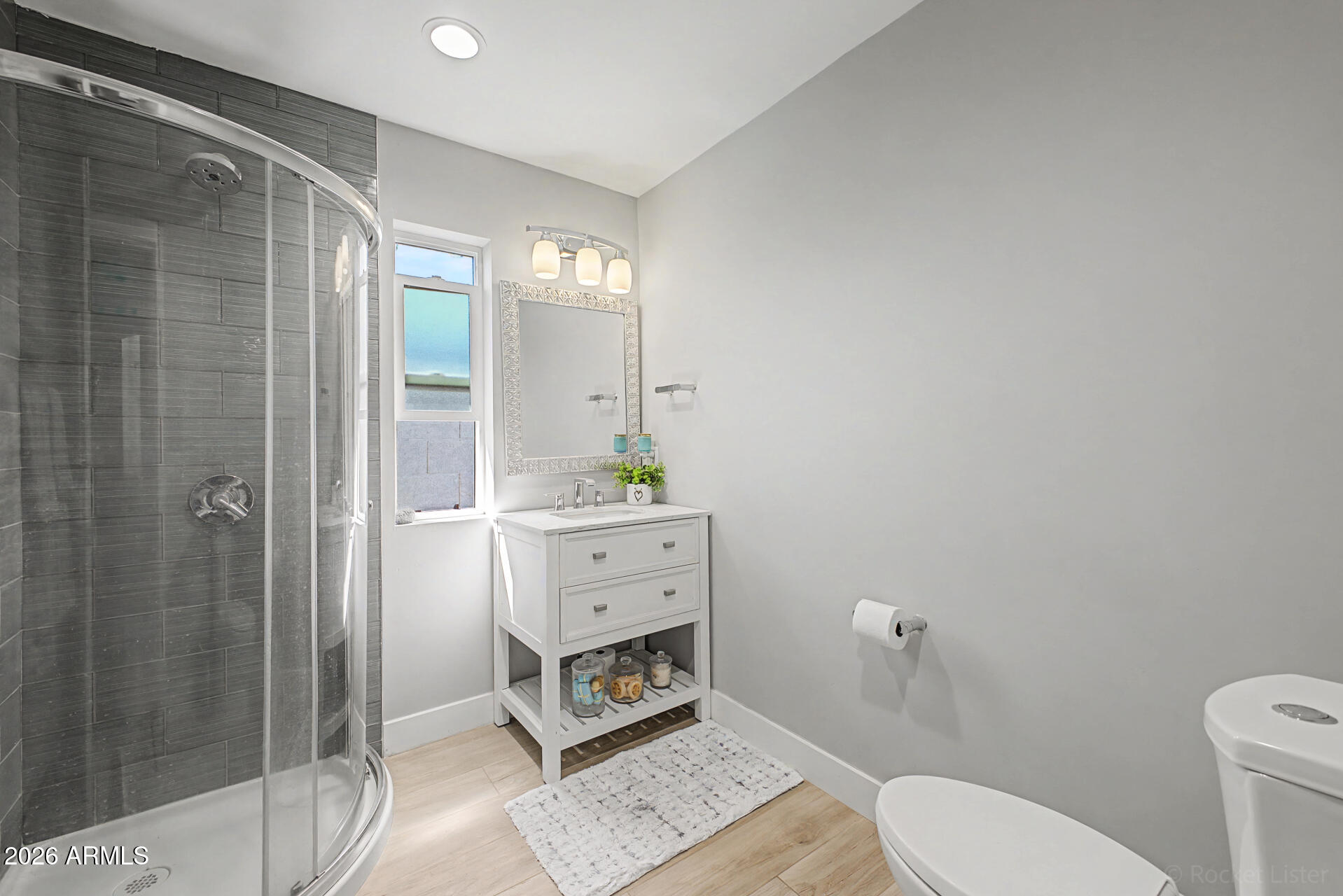 1930 East Rovey Avenue Phoenix, AZ 85016 - Photo 22 of 29 a bathroom with a toilet and a shower