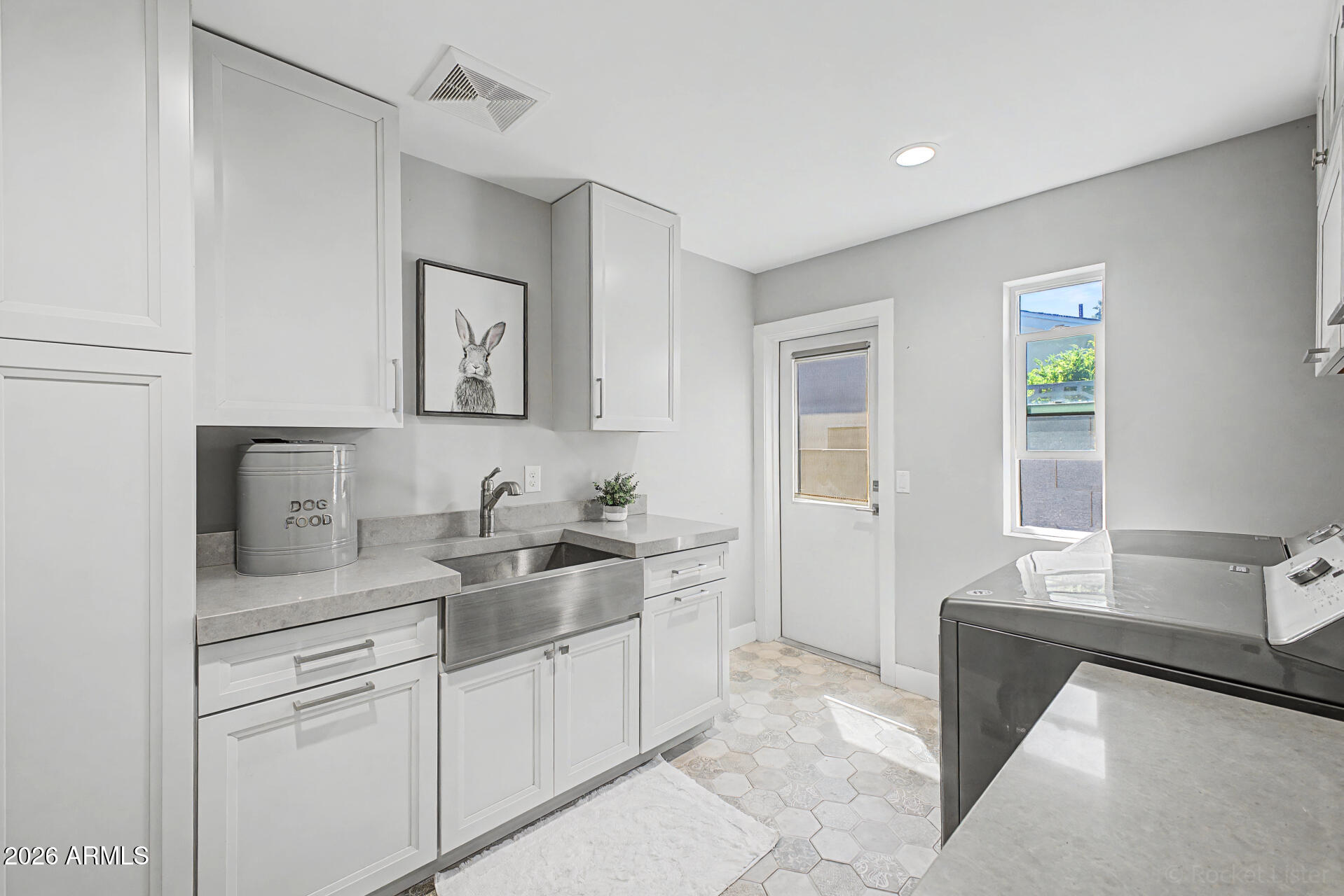 1930 East Rovey Avenue Phoenix, AZ 85016 - Photo 24 of 29 a spacious bathroom with a granite countertop sink and a bathtub