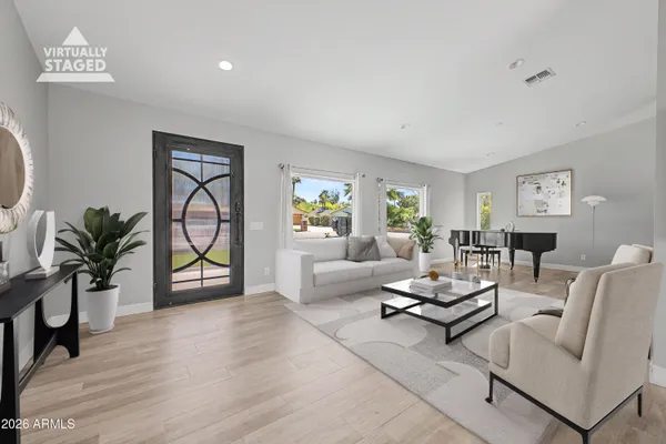 a kitchen with a sink stainless steel appliances and cabinets