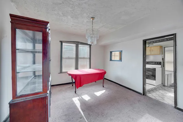 a view of n empty room and window