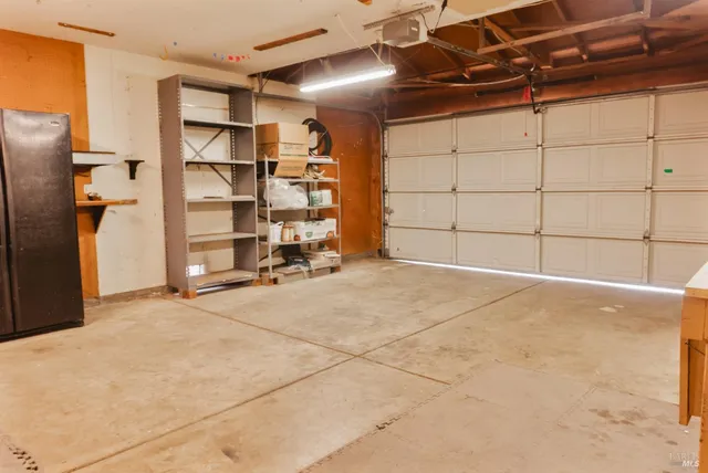 a view of a house with a yard and plants
