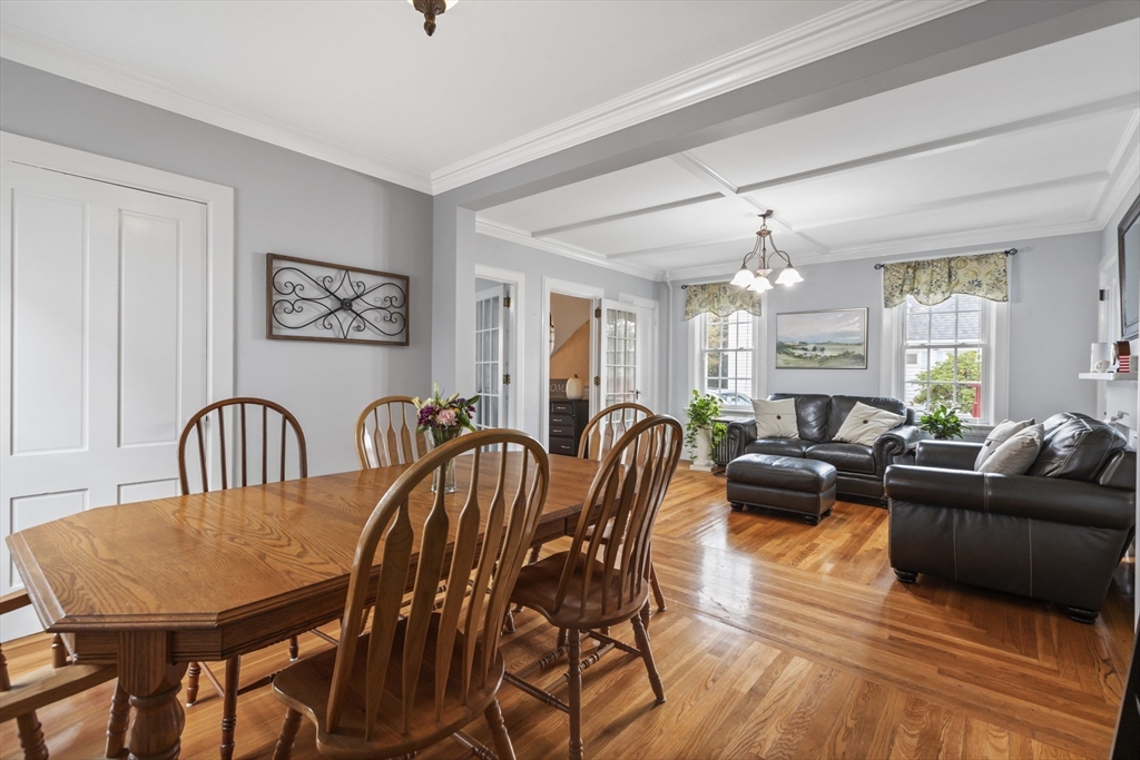 26 Maple Street Taunton, MA 02780 - Photo 17 of 31 a view of a a dining room with furniture window and wooden floor