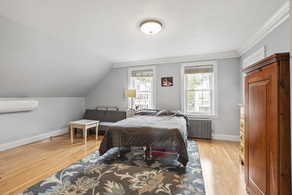 26 Maple Street Taunton, MA 02780 - Photo 21 of 31 a bed room with a bed and a window
