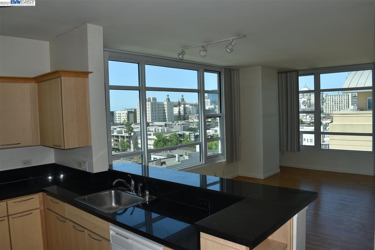 Living room has both lake and city views