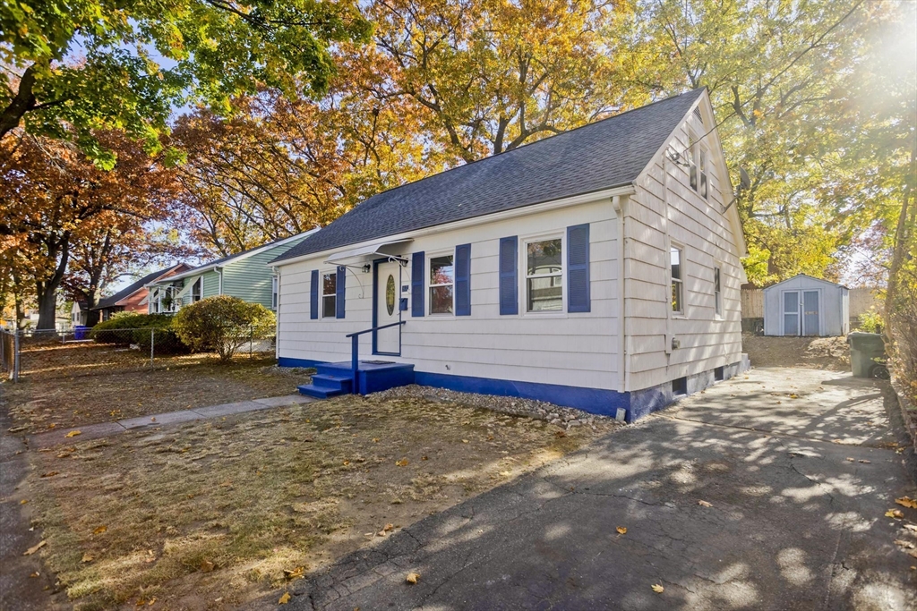 37 Wilber Street Springfield, MA 01104 - Photo 1 of 27 a view of a house with a yard