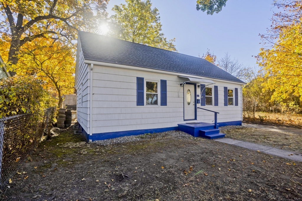 37 Wilber Street Springfield, MA 01104 - Photo 2 of 27 a view of front of a house with a yard