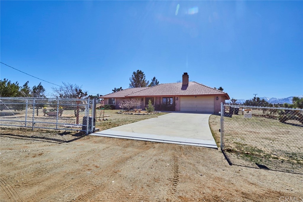 7625 Mono Road Phelan, CA 92371 - Photo 1 of 1 a view of a house with a yard