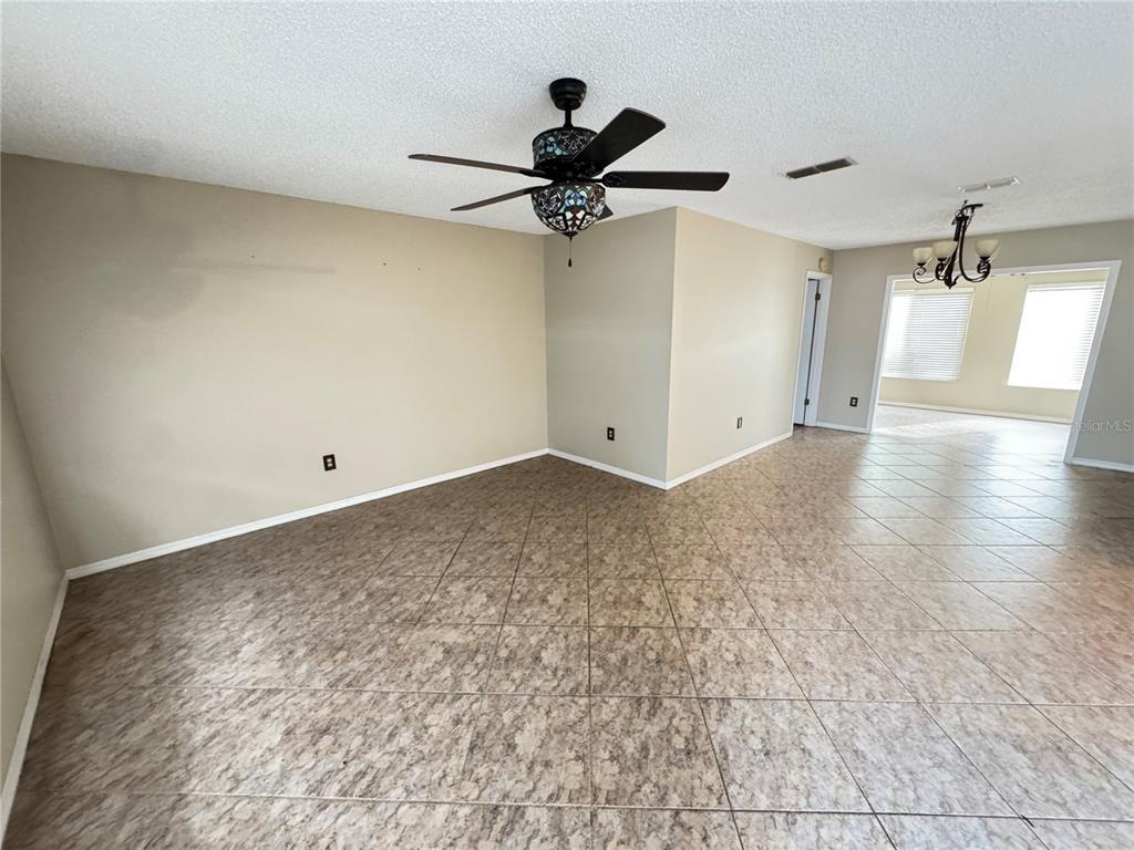 6286 Southwest 110th Street Ocala, FL 34476 - Photo 3 of 14 a view of a ceiling fan in a room