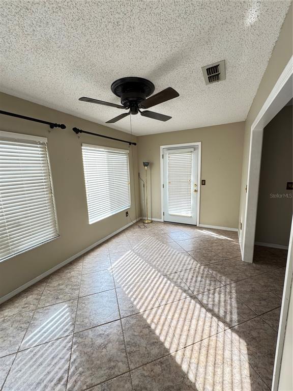 6286 Southwest 110th Street Ocala, FL 34476 - Photo 5 of 14 a bedroom with a bed and a large window