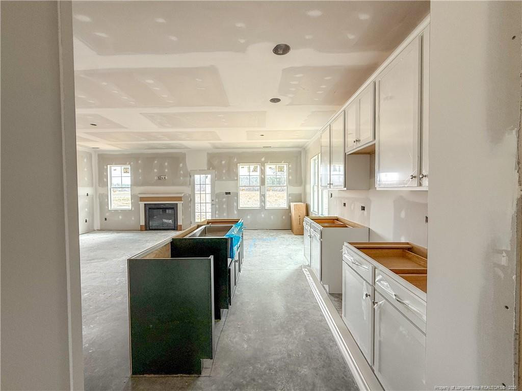 3318 S River Wade, NC 28395 - Photo 4 of 22 a view of living room with furniture and fireplace