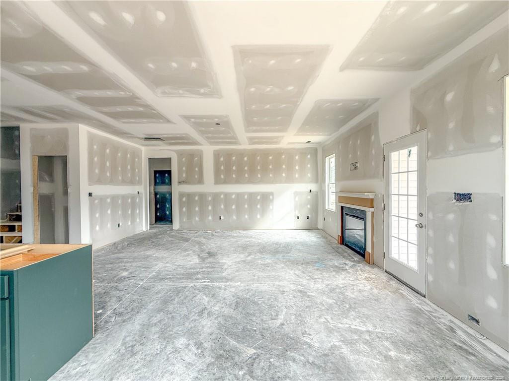 3318 S River Wade, NC 28395 - Photo 7 of 22 a large room with kitchen view and a refrigerator