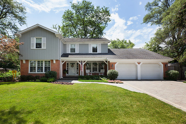 2705 Cherry Lane Northbrook, IL 60062 - Photo 1 of 25 a front view of house with yard and green space