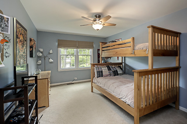2705 Cherry Lane Northbrook, IL 60062 - Photo 16 of 25 a bedroom with a bed and a chandelier