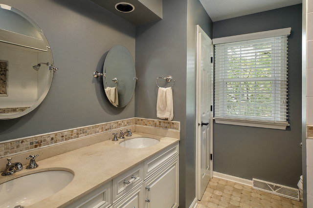 2705 Cherry Lane Northbrook, IL 60062 - Photo 17 of 25 a bathroom with a granite countertop double vanity sink and a mirror
