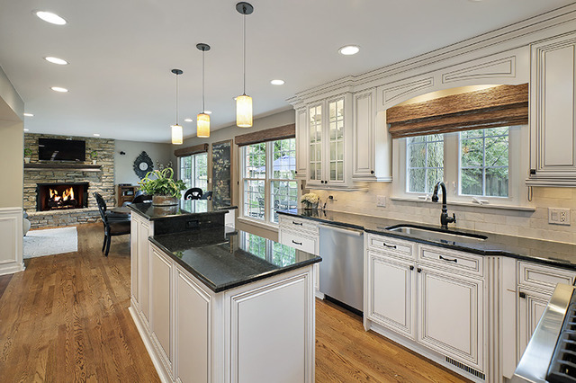 2705 Cherry Lane Northbrook, IL 60062 - Photo 5 of 25 a kitchen with counter top space a sink cabinets appliances and a window