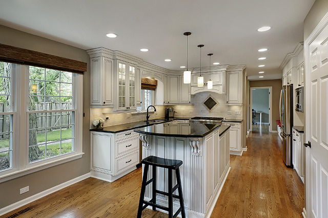 2705 Cherry Lane Northbrook, IL 60062 - Photo 6 of 25 a kitchen with counter top space a sink appliances and cabinets