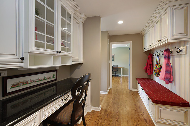 2705 Cherry Lane Northbrook, IL 60062 - Photo 9 of 25 a hallway with a stove and white cabinets