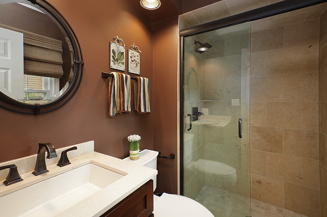 2705 Cherry Lane Northbrook, IL 60062 - Photo 10 of 25 a bathroom with a toilet sink and mirror