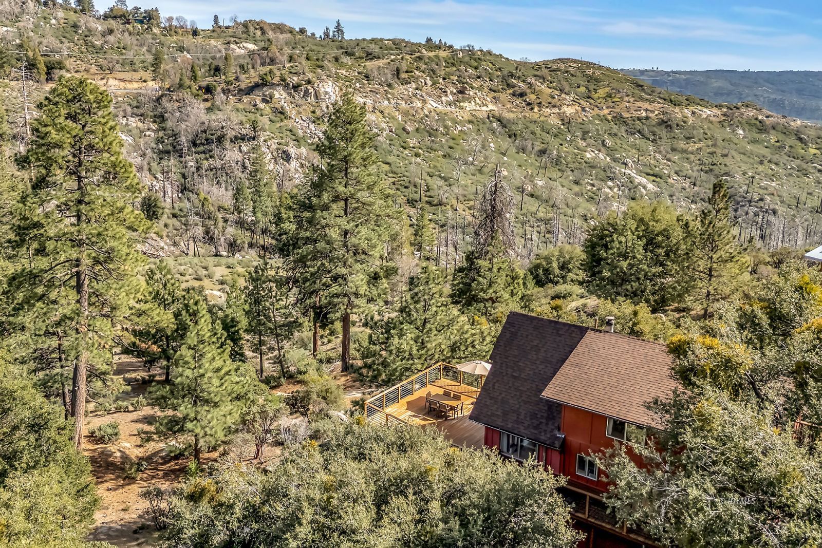 26870 Robin Drive Idyllwild, CA 92549 - Photo 1 of 68 an aerial view of a house with a yard and mountain view in back