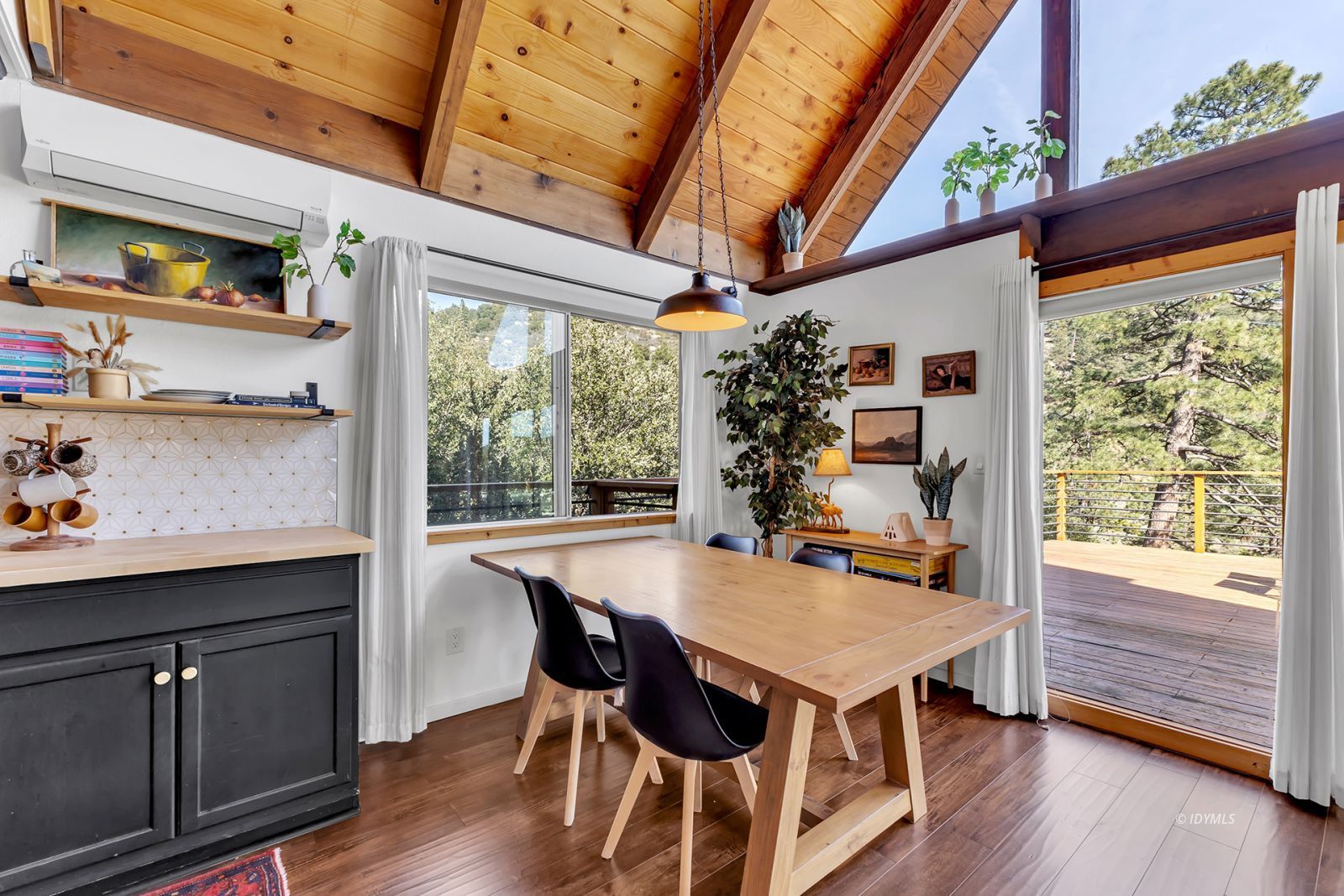26870 Robin Drive Idyllwild, CA 92549 - Photo 28 of 68 a view of a dining room with furniture window and wooden floor