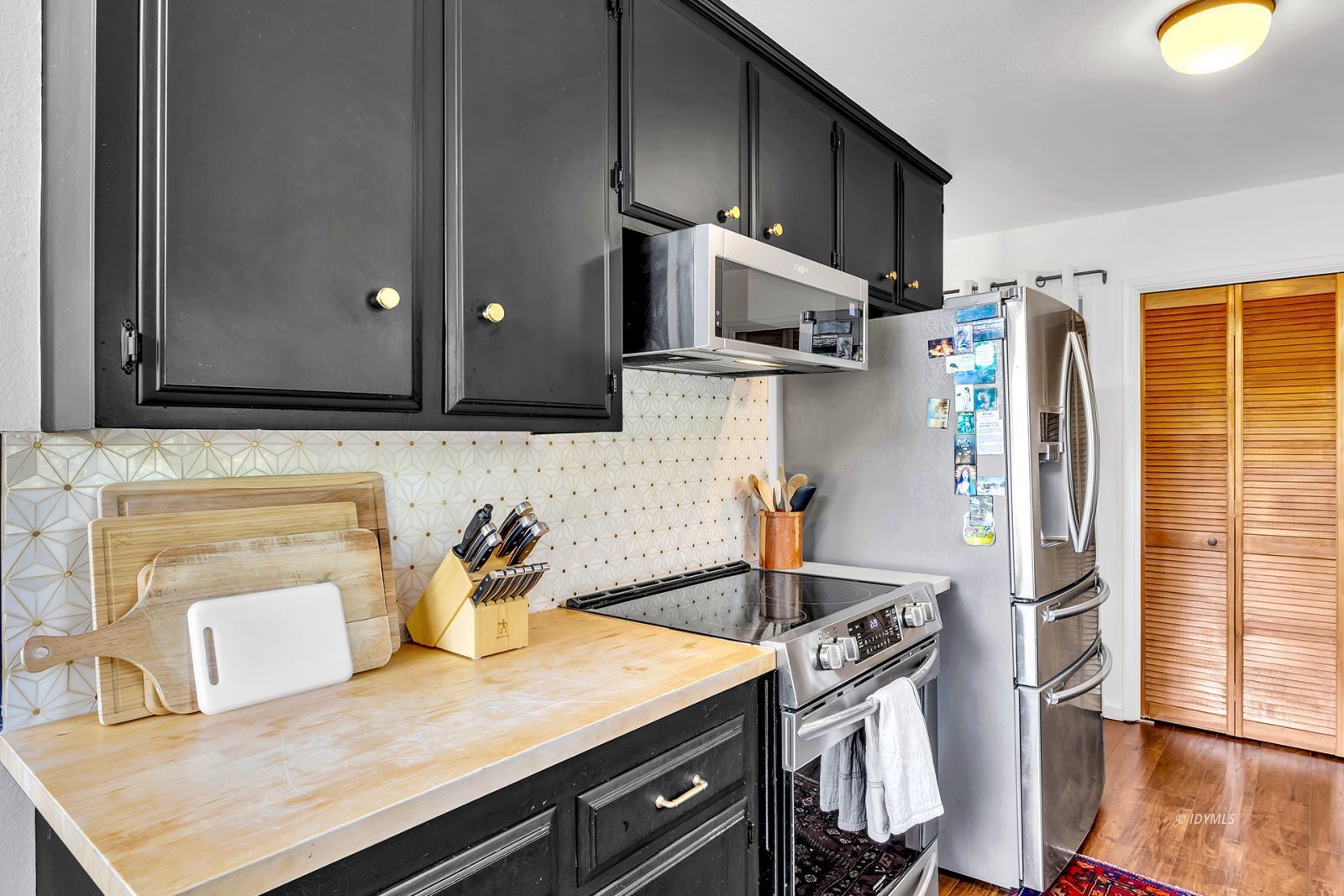 26870 Robin Drive Idyllwild, CA 92549 - Photo 33 of 68 a kitchen with stainless steel appliances granite countertop a sink and a stove