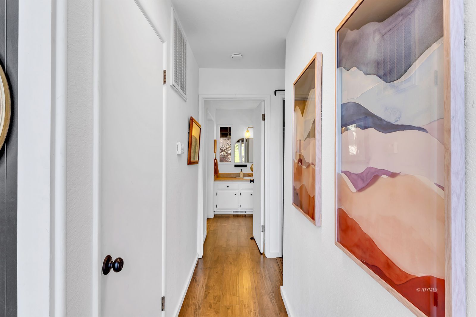 26870 Robin Drive Idyllwild, CA 92549 - Photo 36 of 68 a view of a hallway with wooden floor and staircase