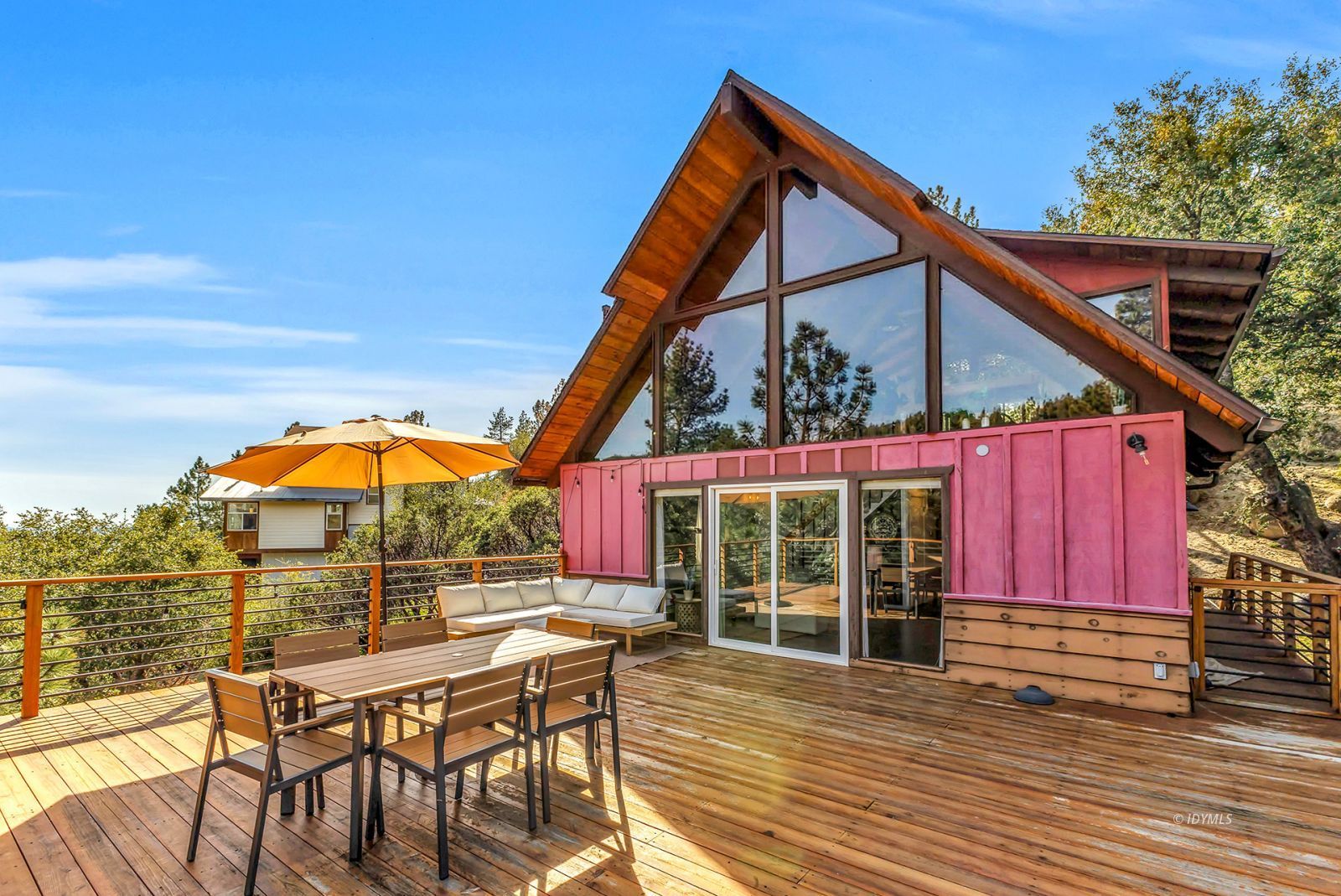 26870 Robin Drive Idyllwild, CA 92549 - Photo 45 of 68 a view of a two chairs and table in the patio next to a yard