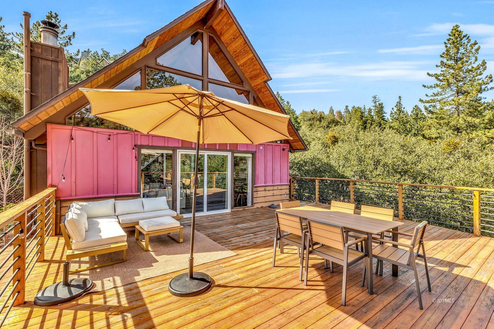 26870 Robin Drive Idyllwild, CA 92549 - Photo 46 of 68 a patio with a table and chairs