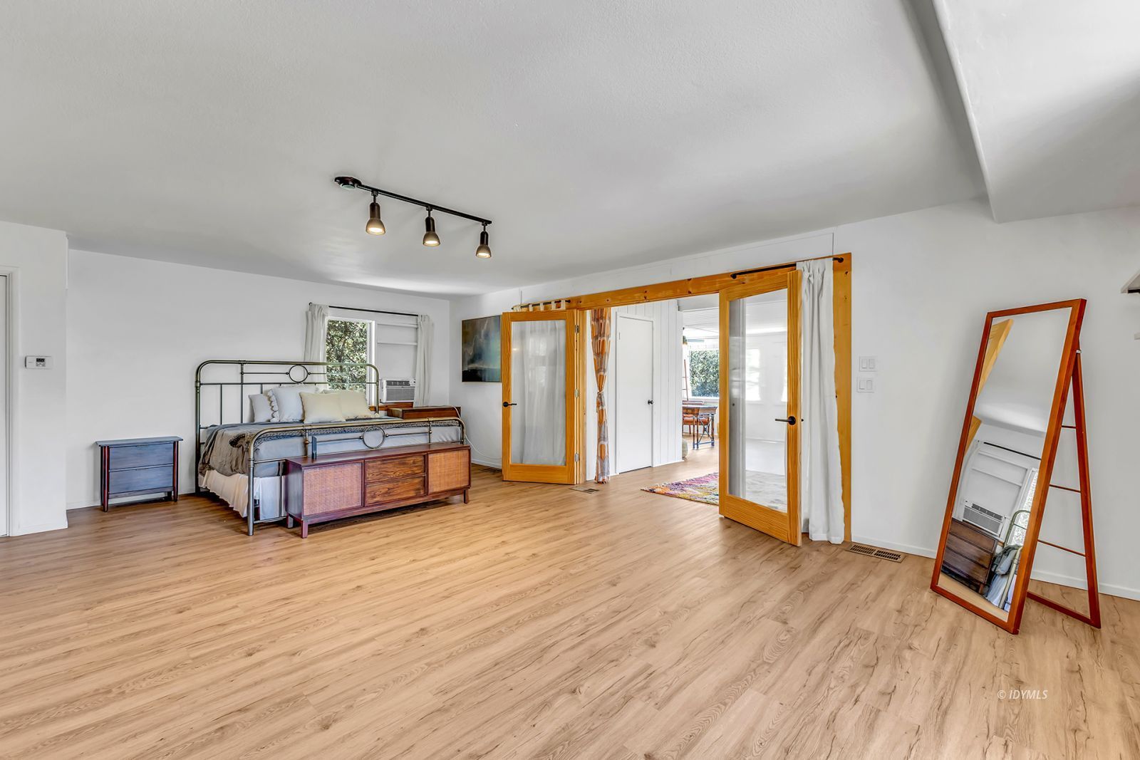 26870 Robin Drive Idyllwild, CA 92549 - Photo 49 of 68 a bedroom with furniture and a wooden floor