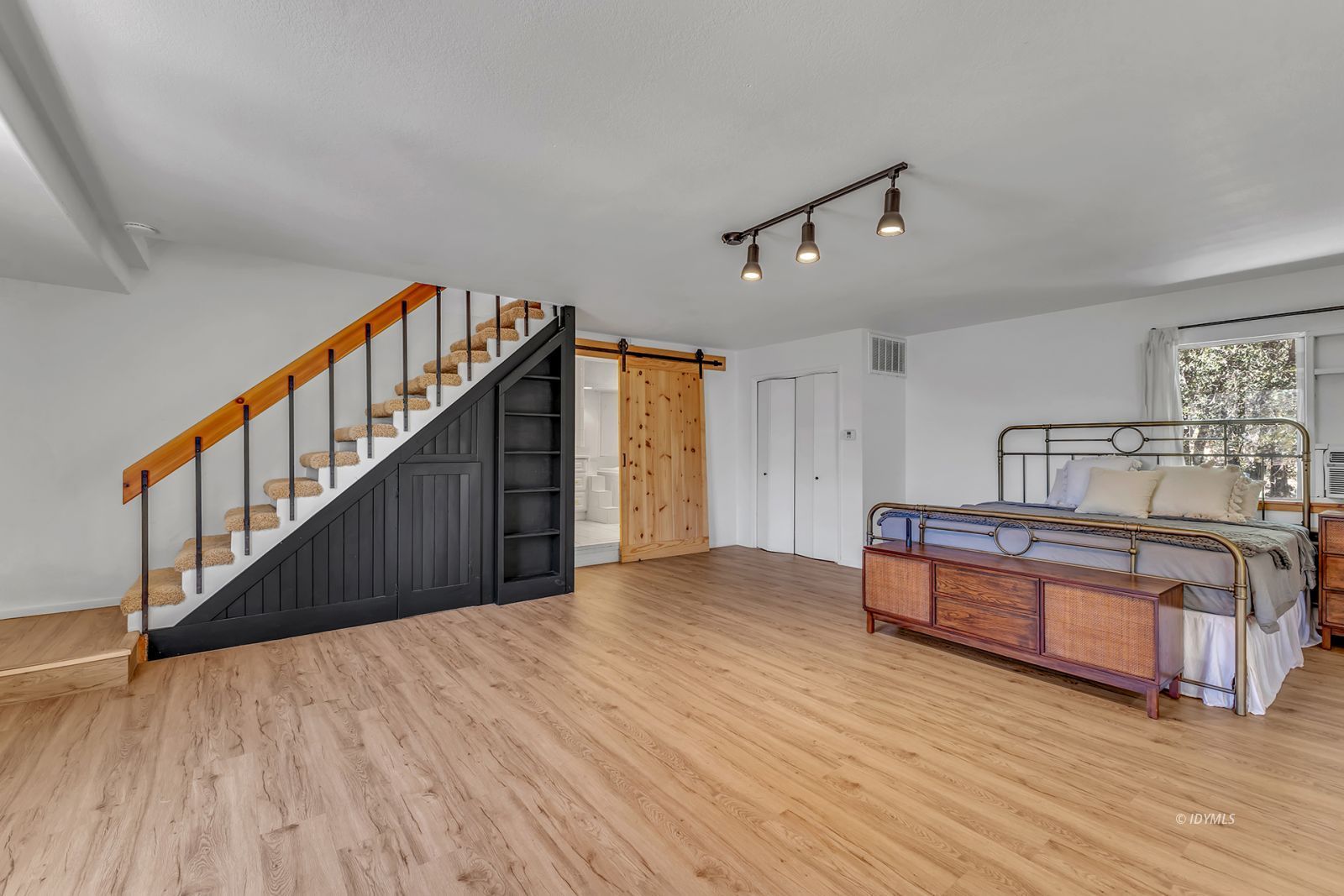 26870 Robin Drive Idyllwild, CA 92549 - Photo 50 of 68 a view of a room with cabinet and wooden floor