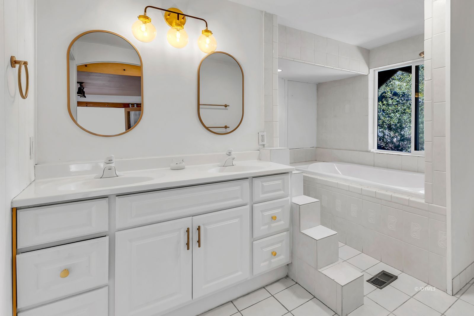 26870 Robin Drive Idyllwild, CA 92549 - Photo 54 of 68 a bathroom with a double vanity sink and a mirror