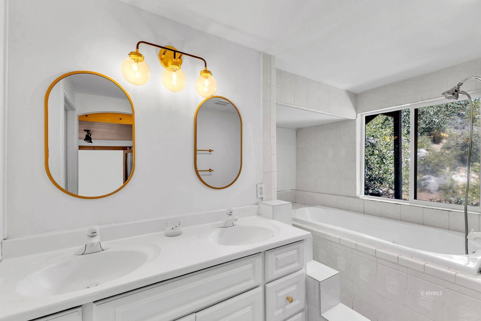 26870 Robin Drive Idyllwild, CA 92549 - Photo 55 of 68 a bathroom with a sink and a mirror