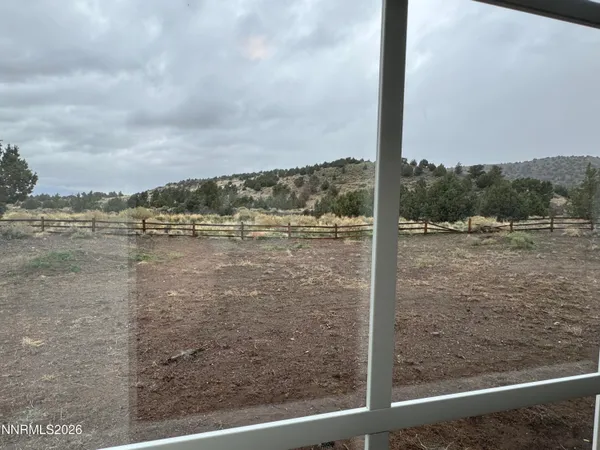 a view of a lake from a balcony