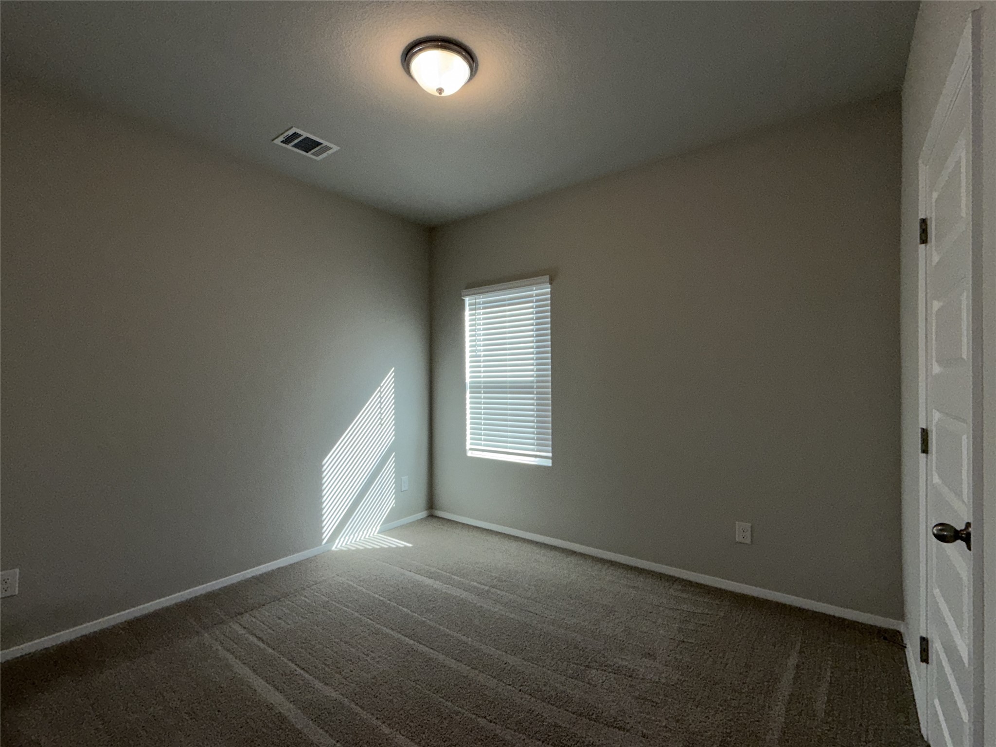 129 Tall Grass Drive Georgetown, TX 78628 - Photo 12 of 21 an empty room with windows