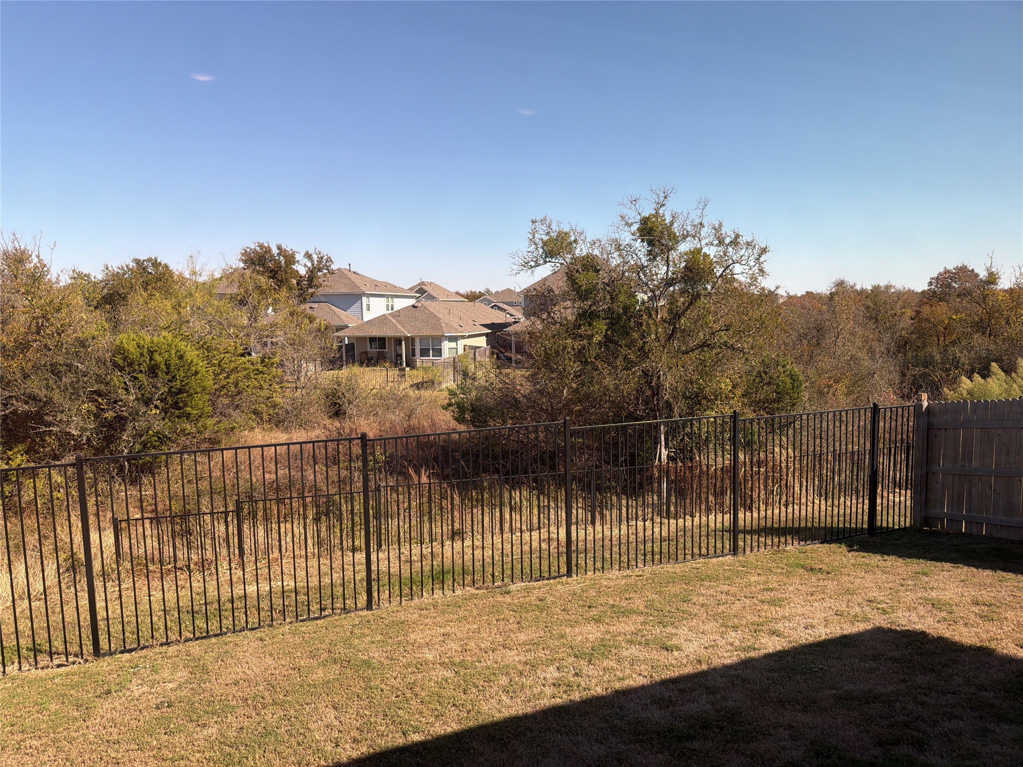 129 Tall Grass Drive Georgetown, TX 78628 - Photo 17 of 21 a view of a backyard
