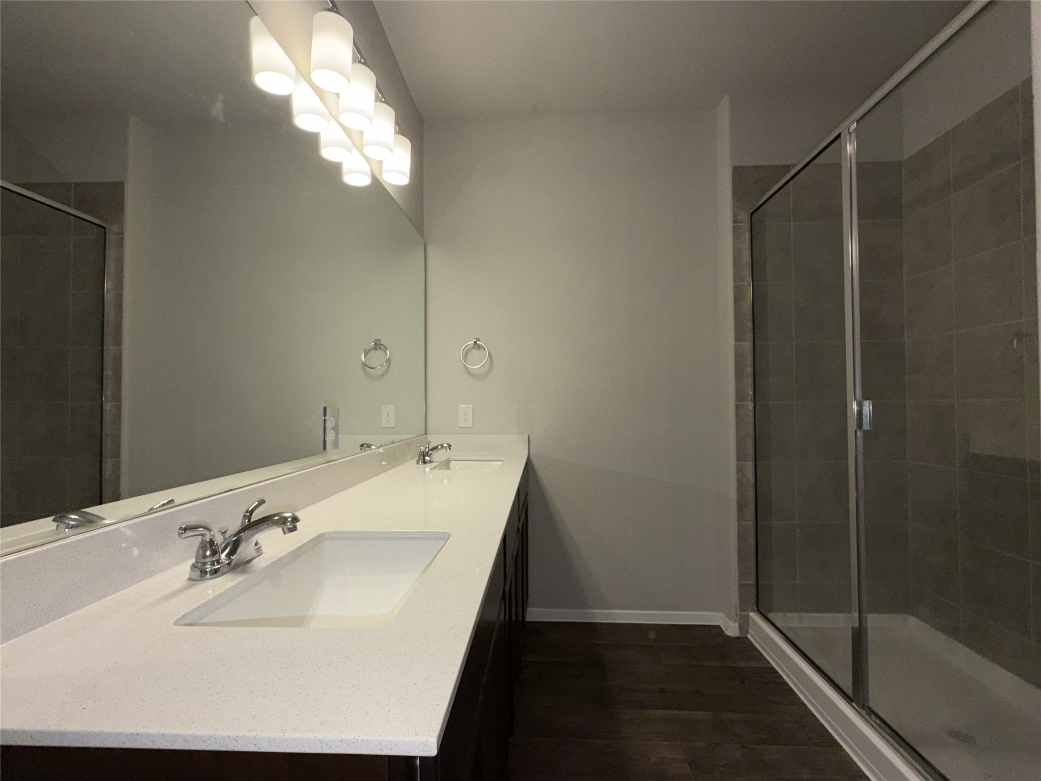 129 Tall Grass Drive Georgetown, TX 78628 - Photo 10 of 21 a bathroom with a sink and a mirror