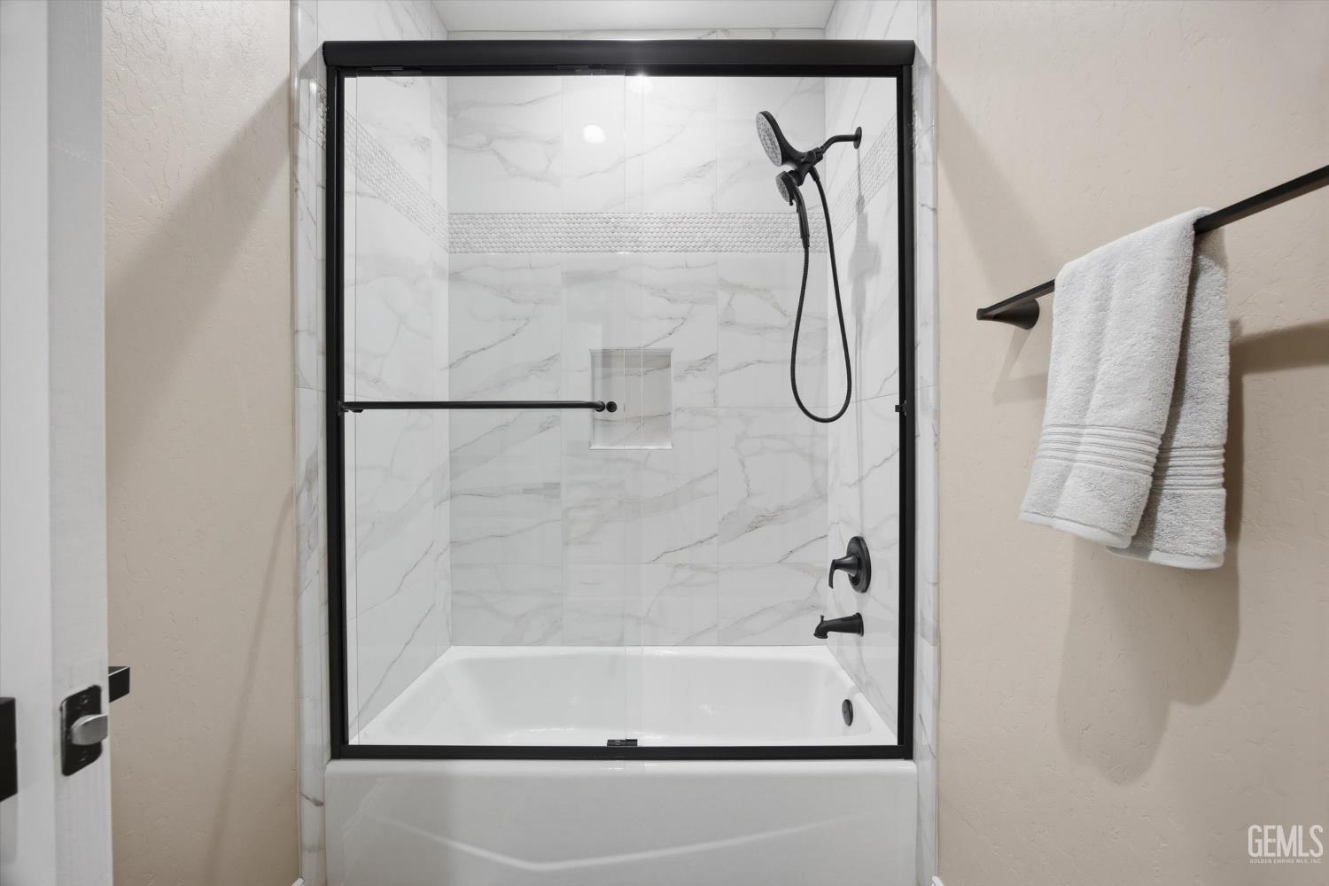 Undisclosed Address Tehachapi, CA 93561 - Photo 38 of 47 a bathroom with a glass shower door