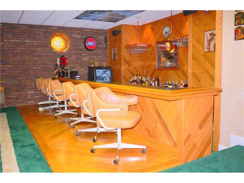 552 Blackhawk Road Beaver Falls, PA 15010 - Photo 14 of 24 Family Room. Wonderful sunkin Bar, Bartender is at eye level with the guests who sit in comphy reg height chairs., This entire area has w/w carpet. Football field green??