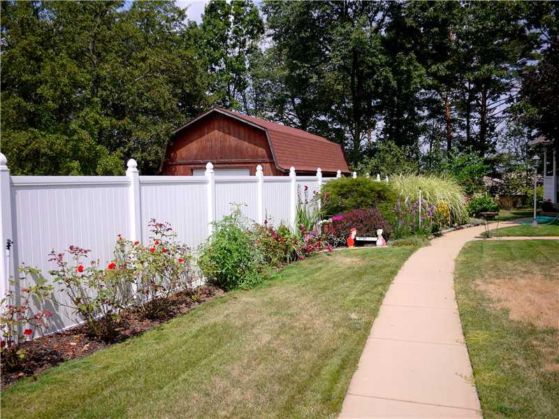 552 Blackhawk Road Beaver Falls, PA 15010 - Photo 20 of 24 Yard/Garden. Just one view of the lovely garden and many planting areas surrounding this home. Stained cement walkways make for a relaxing stroll.