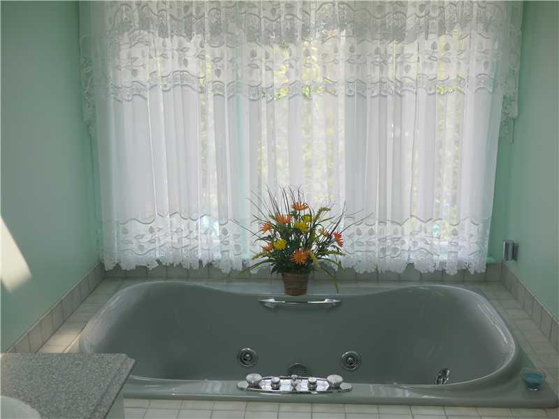 552 Blackhawk Road Beaver Falls, PA 15010 - Photo 10 of 24 Master Bath/Spa. Elegant Spa Tub with a window that over looks the pool! Stunning!