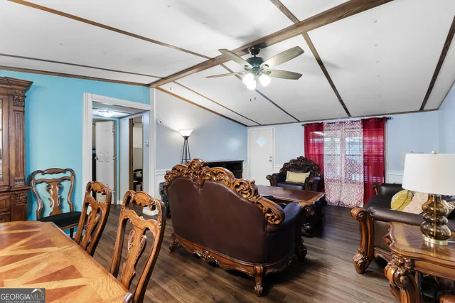 a bed room with furniture and a window