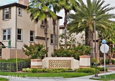 12 Jaynes Place Buena Park, CA 90621 - Photo 11 of 12 a front view of a house with garden and trees