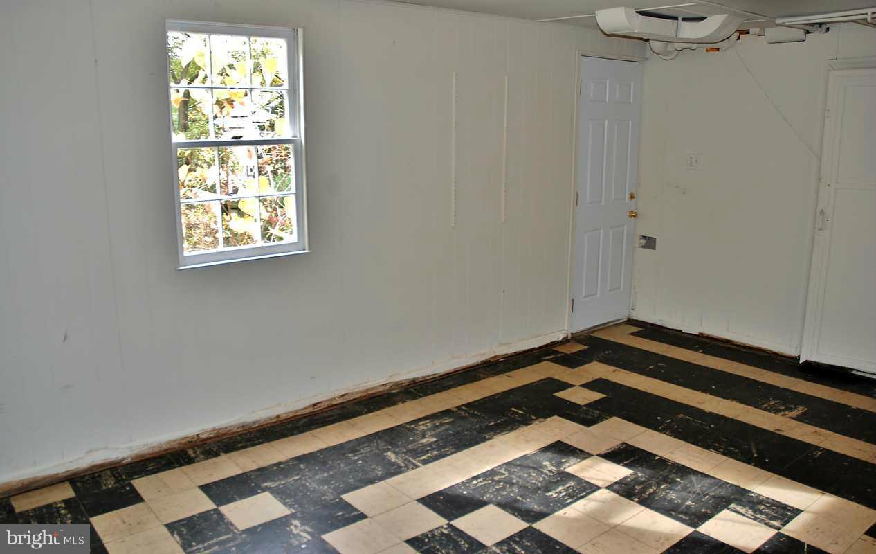 6210 Greentree Road Bethesda, MD 20817 - Photo 16 of 18 Lower Level Family Room
