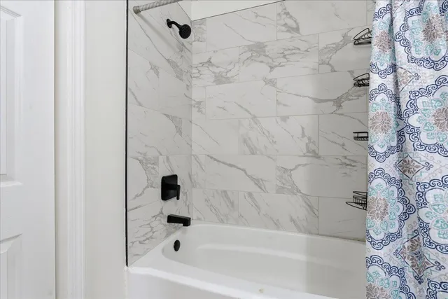 a bathroom with a bathtub