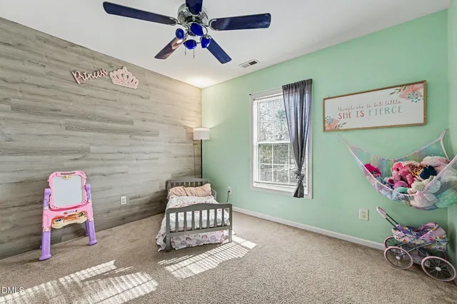 a spacious bathroom with bathtub and shower